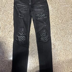 AMIRI Black Distressed Skinny Jeans